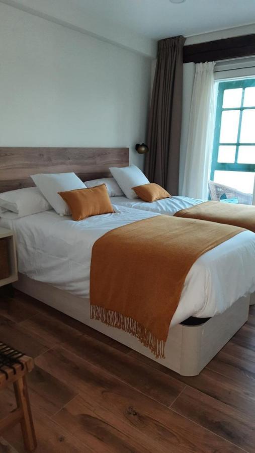 Apartamentos El Muelle Комильяс Экстерьер фото